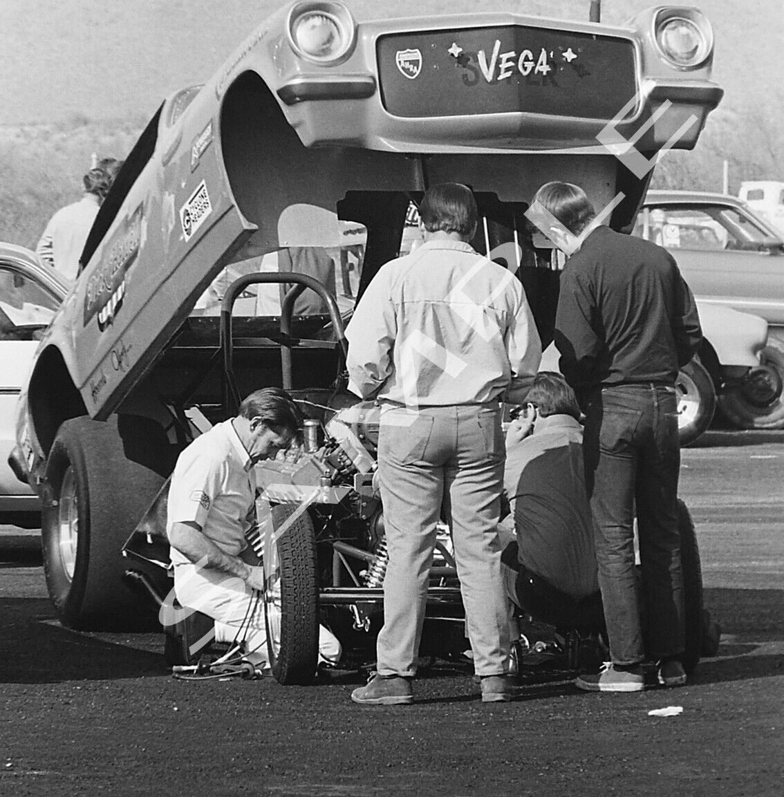 8 x 10" B&W Photo Of Dickie Harrell Working On His Vega Funny Car