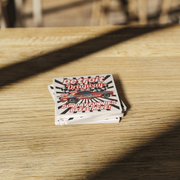 Detroit_Dragway_Perry_Wyatts_Super_Cama_SquareStoneCoaster_WoodTable_AS_Mockup.png